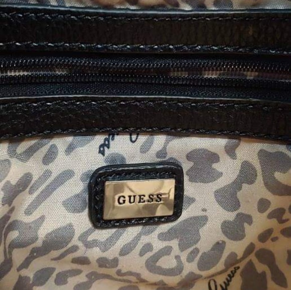 Black Guess Handbag with Pink Flower Embellishment - Picture 2 of 4